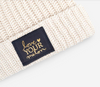 Love Your Melon White Speckled Cuffed Beanie (Navy Gold Foil Patch)
